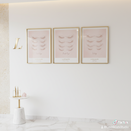 Set of 3 lash map framed wall art prints in a pink and gold lash studio
